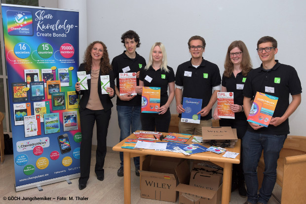 Dr. Lyashenko with members of the Jungchemiker and brochures